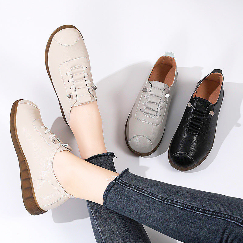 Three pairs of shoes in beige, gray, and black on a white background.