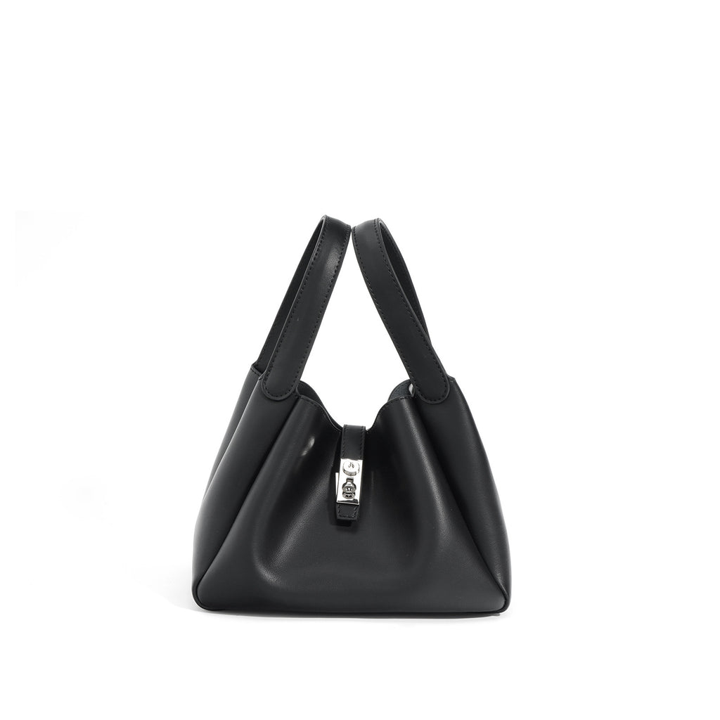 Black handbag with a silver clasp on a white background