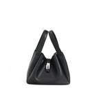 Black handbag with a silver clasp on a white background