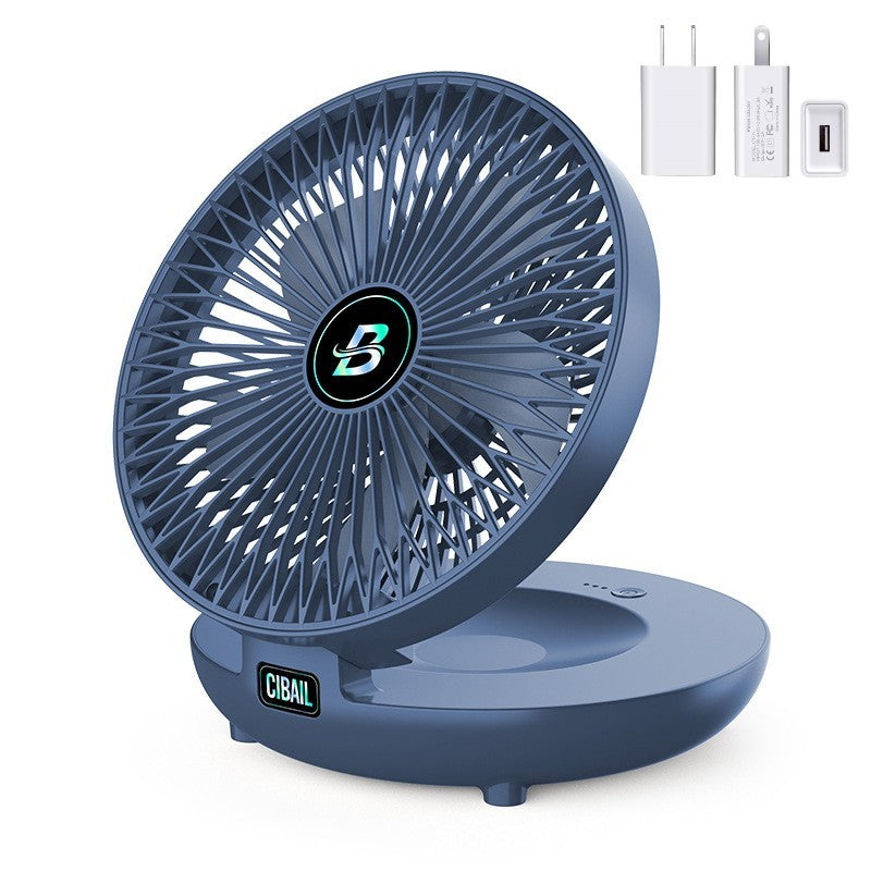 Blue portable fan with charging accessories on a white background
