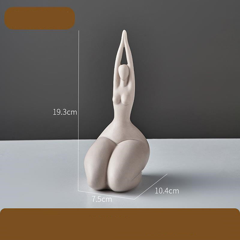 Decorative sculpture of a person in a yoga pose with measurements on a gray background