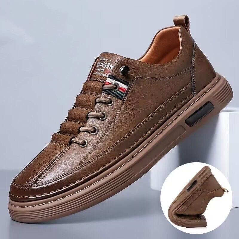 Brown leather shoe with a close-up inset on a light gray background