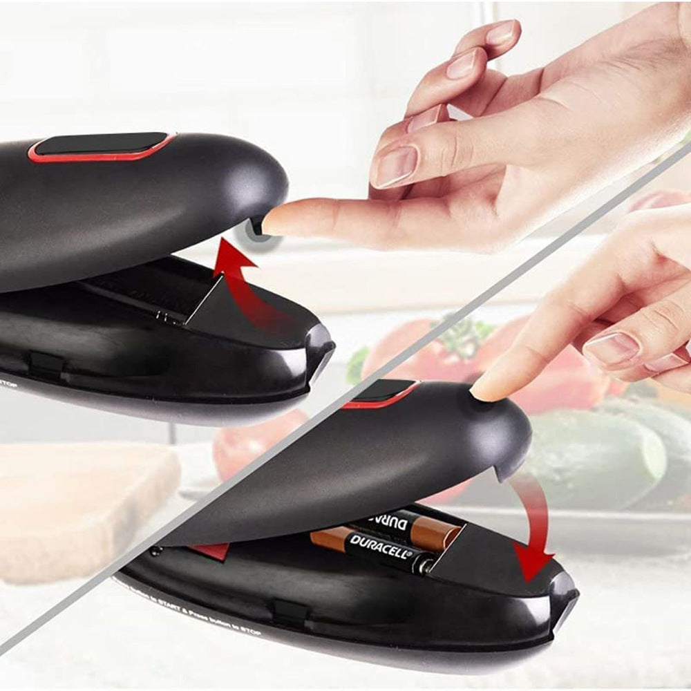 Black and red device with a battery being inserted, surrounded by blurred food images.