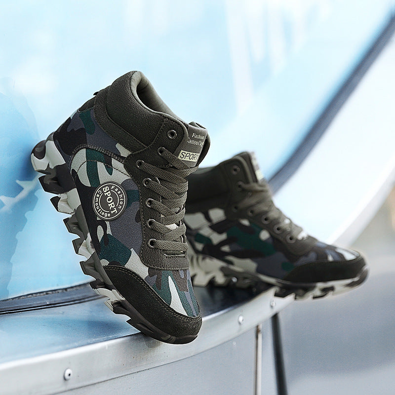 Camouflage sneakers with brand logo on a metallic surface