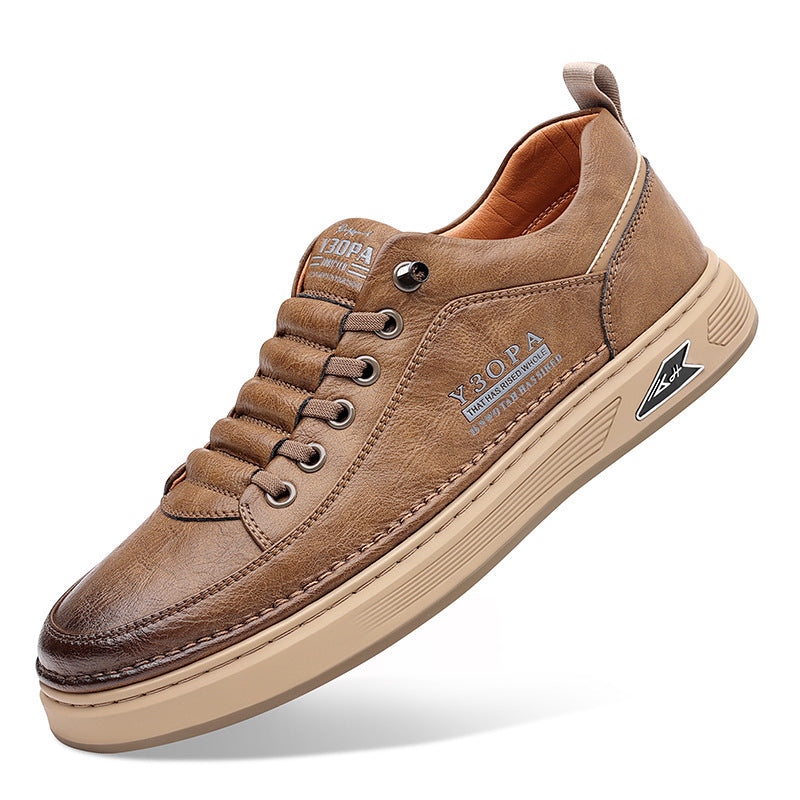Brown leather sneaker with visible brand logo on a white background