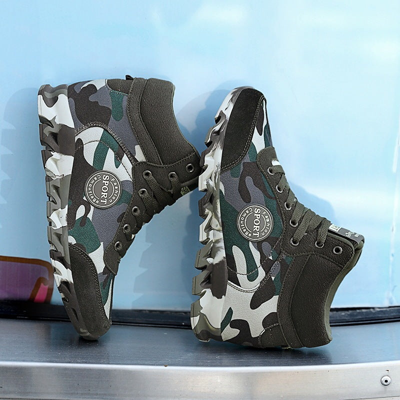 Camouflage-patterned boots on a reflective surface with a blue background