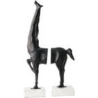 Black abstract sculpture on a white background