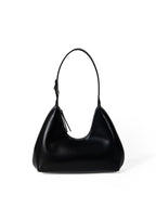 Black handbag on a white background