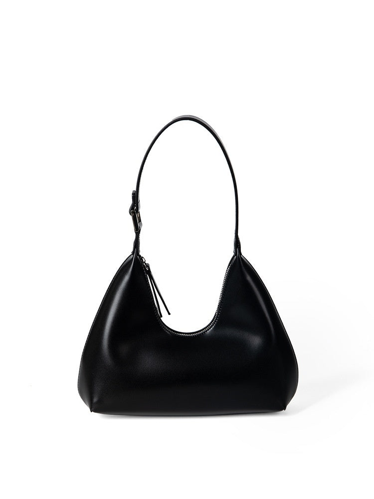Black handbag on a white background