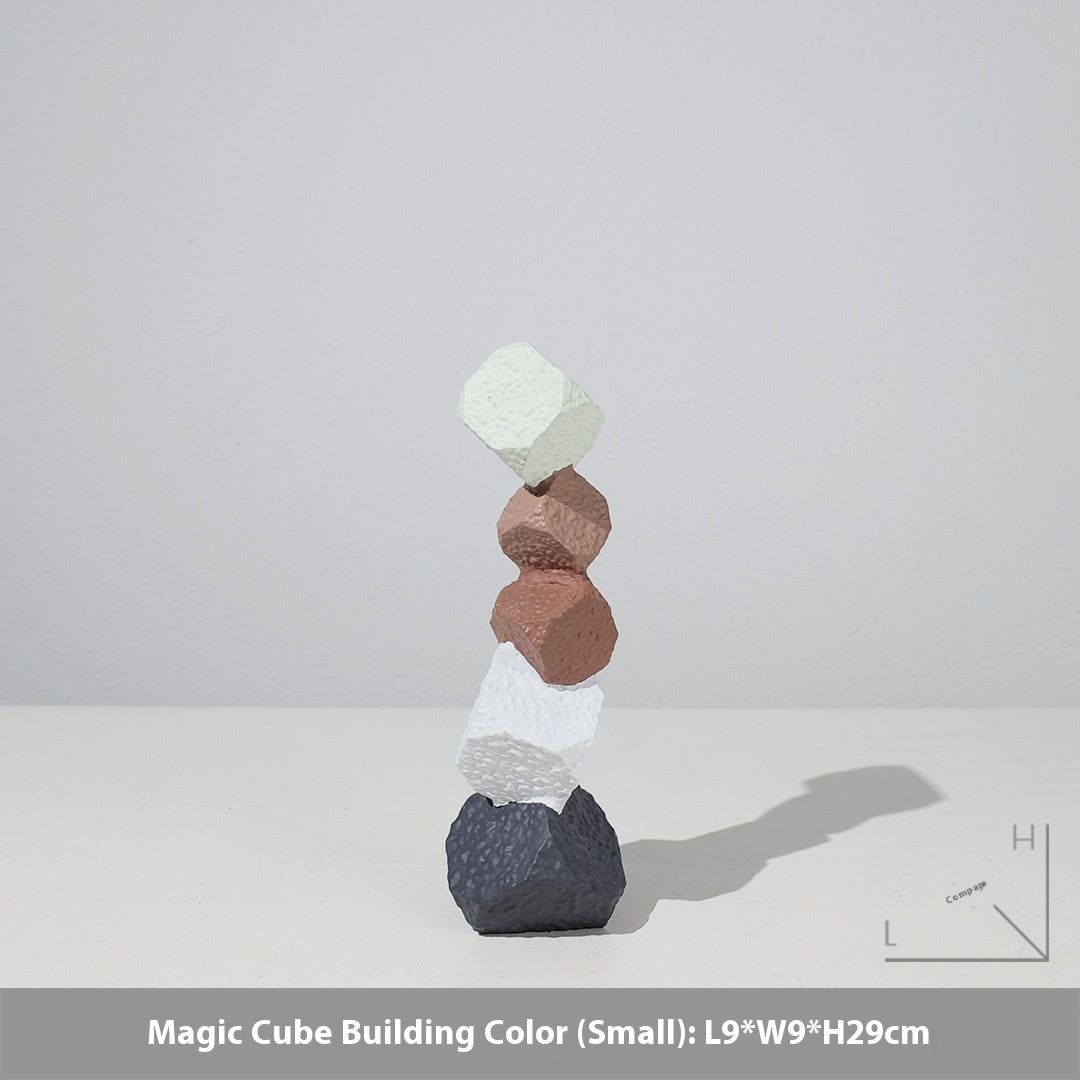 Stack of colorful geometric blocks on a white background