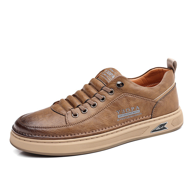 Brown leather sneaker on a white background
