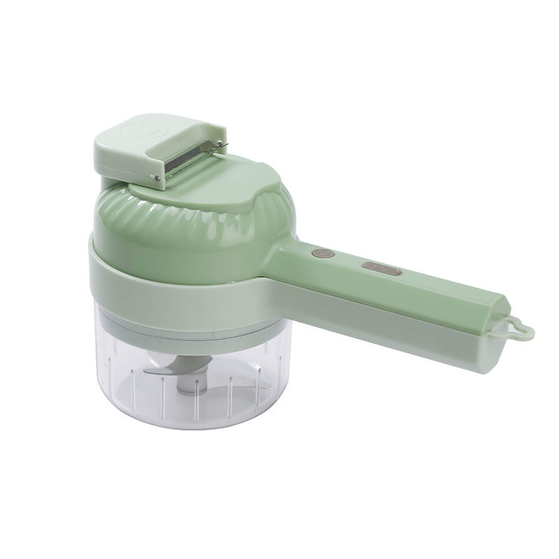 Handheld green kitchen chopper on a white background