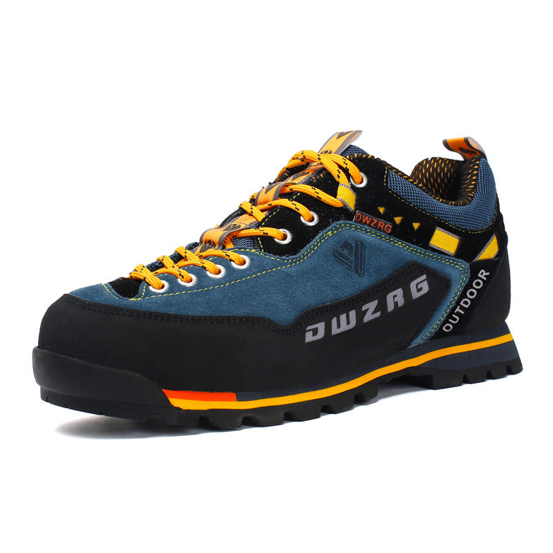 Blue and black outdoor shoe with yellow accents on a white background