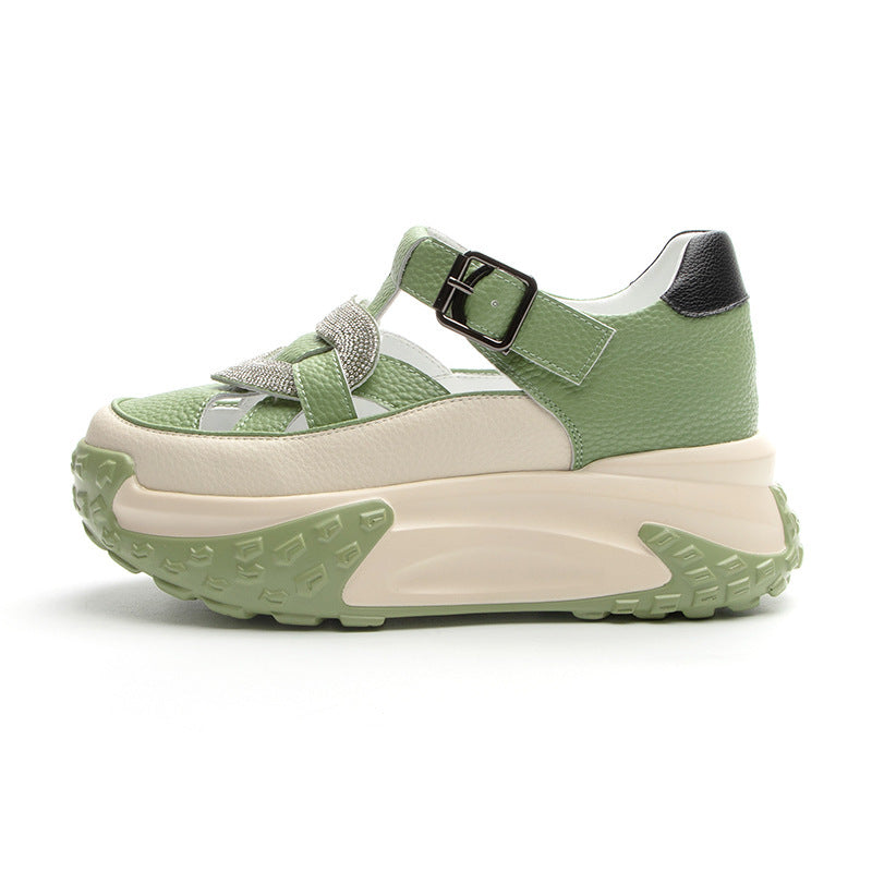 Green and beige sneaker with a thick sole on a white background