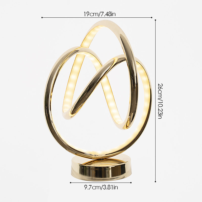 Gold circular lamp with dimensions on a white background