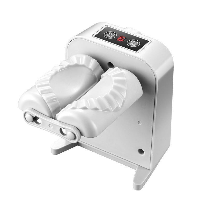 White dumpling maker with digital display on a white background