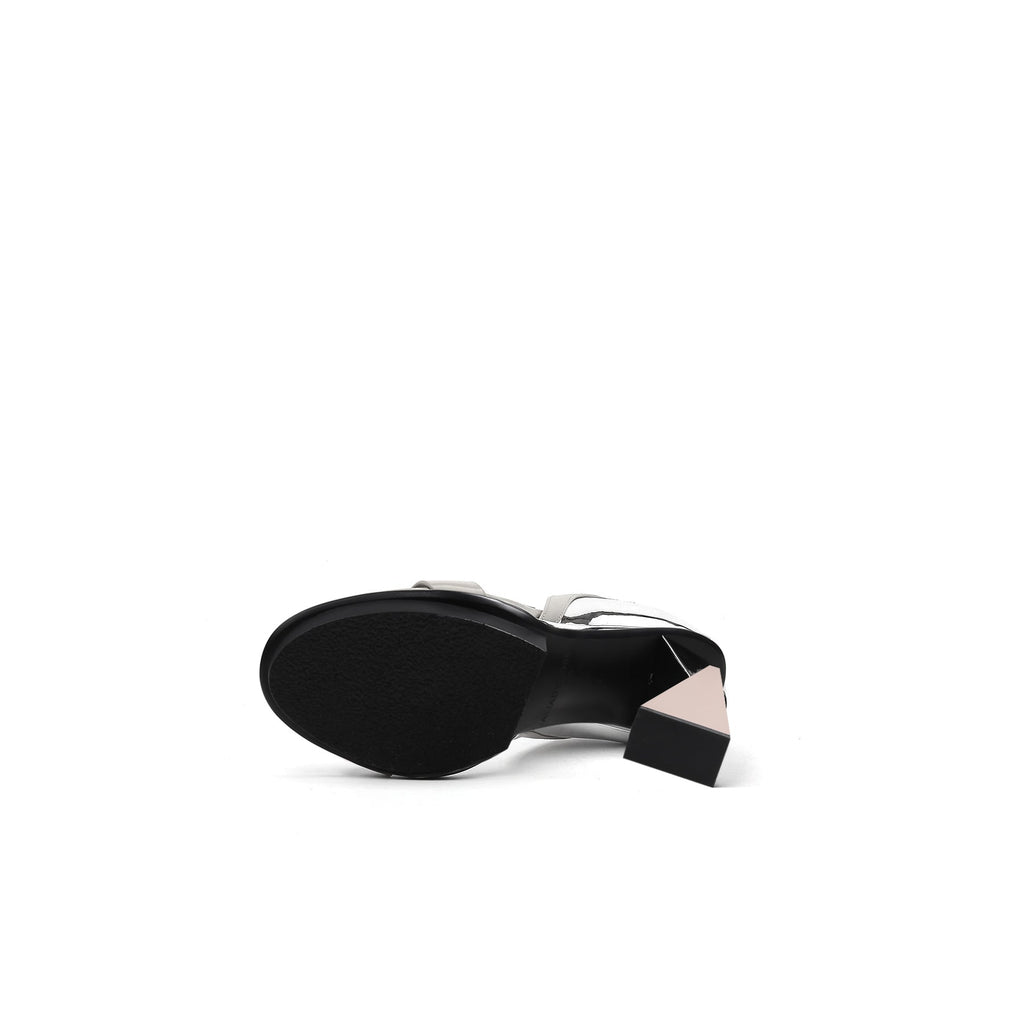 Sole view of stylish trapezoidal skyscraper heels for women, featuring a geometric design and breathable open-toe fit.