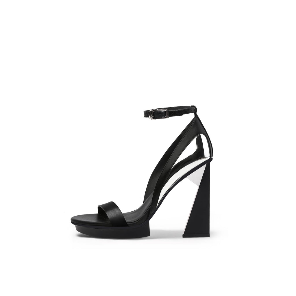 Stylish black trapezoidal skyscraper heels with ankle strap and open-toe design, perfect for elegant occasions.